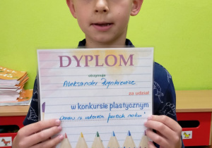 Olek z dyplomem