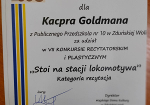 dyplom - dla Kacpra Goldmana z Publicznego Przedszkola Nr 10 w Zduńskiej Woli za udział w VII Konkursie Recytatorskim i Plastycznym "Stoi na stacji lokomotywa" w kategorii recytacja