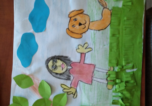 praca plastyczna wykonana kredką i wycinanka z kolorowego papieru - dziewczynka bawi się z psem na trawie, pod drzewem