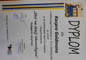 dyplom - dla Kacpra Goldmana z Publicznego Przedszkola Nr 10 w Zduńskiej Woli za udział w VII Konkursie Recytatorskim i Plastycznym "Stoi na stacji lokomotywa" w kategorii recytacja