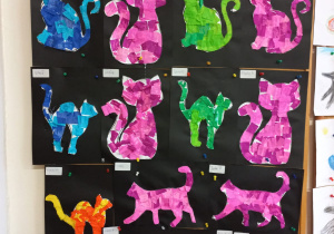 prace plastyczne - kolorowy kot - kontury kotów w różnych pozycjach wyklejone kolorową bibułą